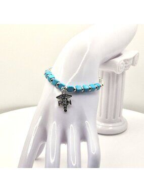 RN Charm Bracelet With Silver Tone Beads & Turquoise Accents